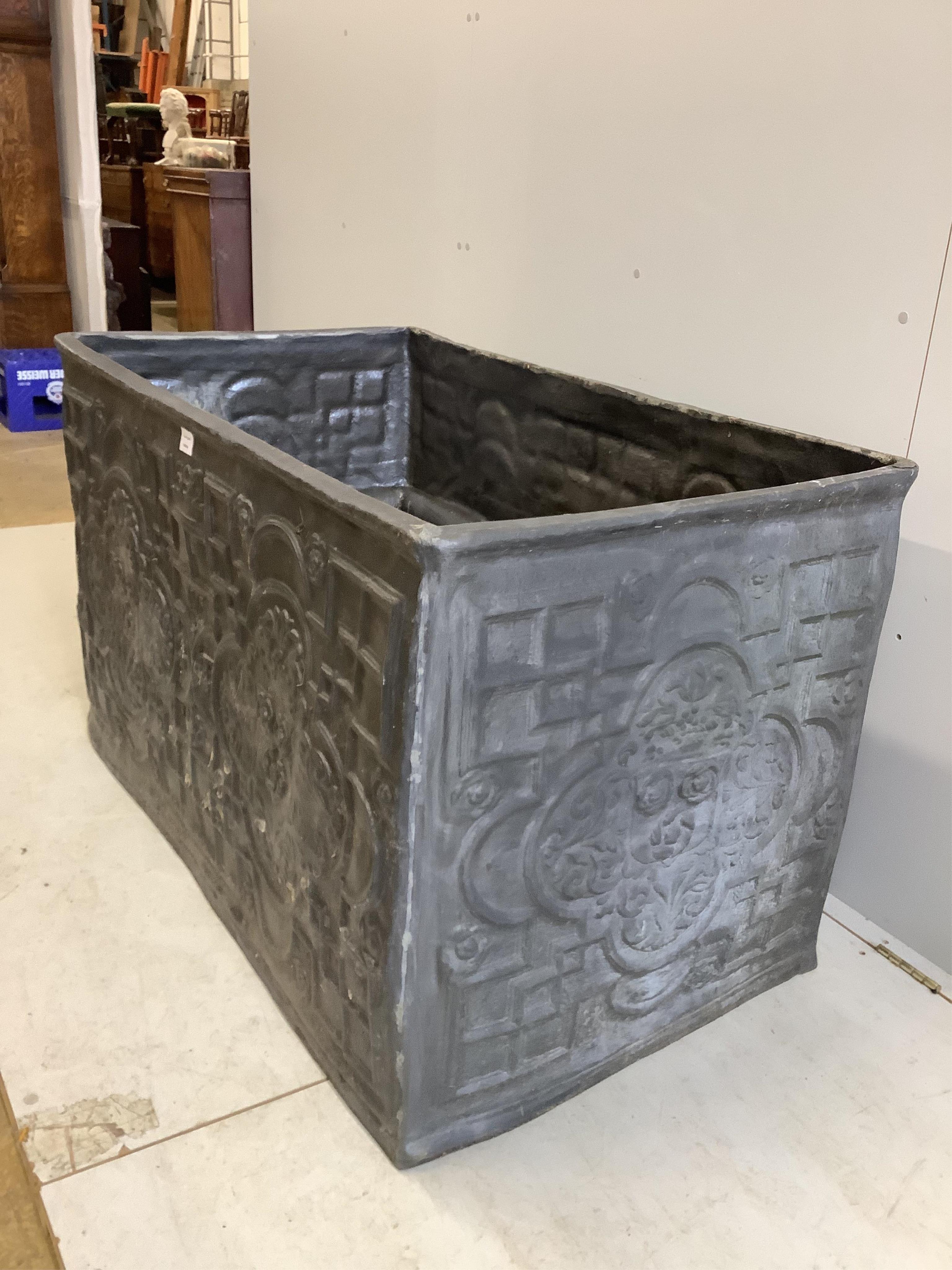 A rectangular faux lead water cistern, width 124cm, depth 71cm, height 74cm. Condition - good